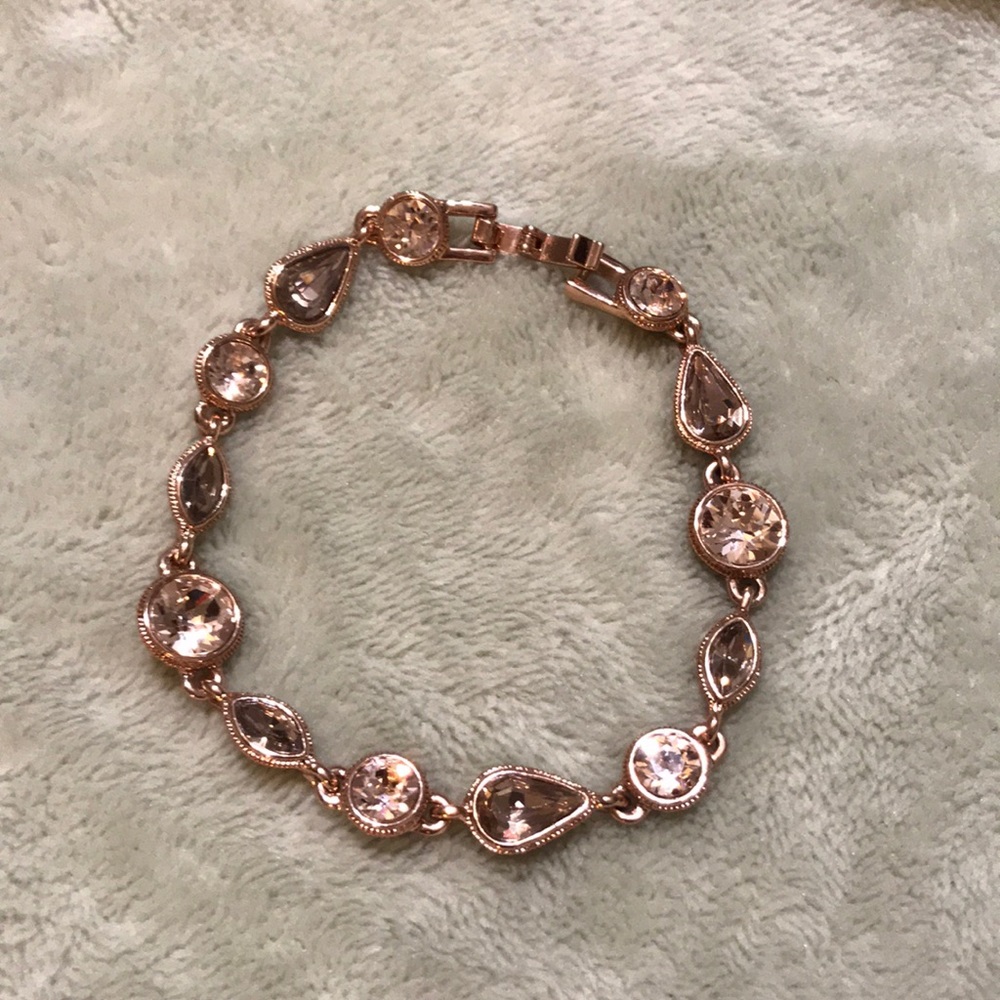 Rose gold Givenchy bracelet.